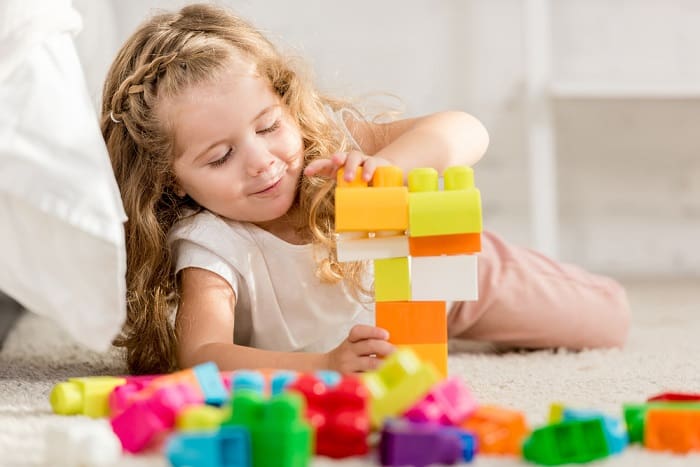 Girl playing with blocks